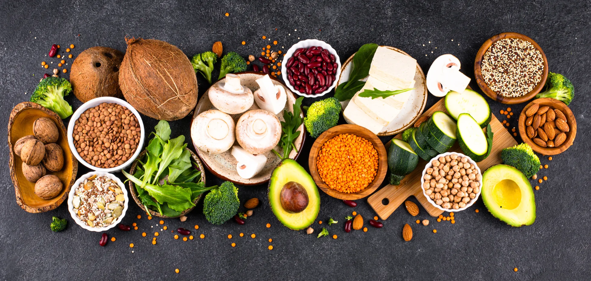 A healthy avocado and measuring tape representing weight management