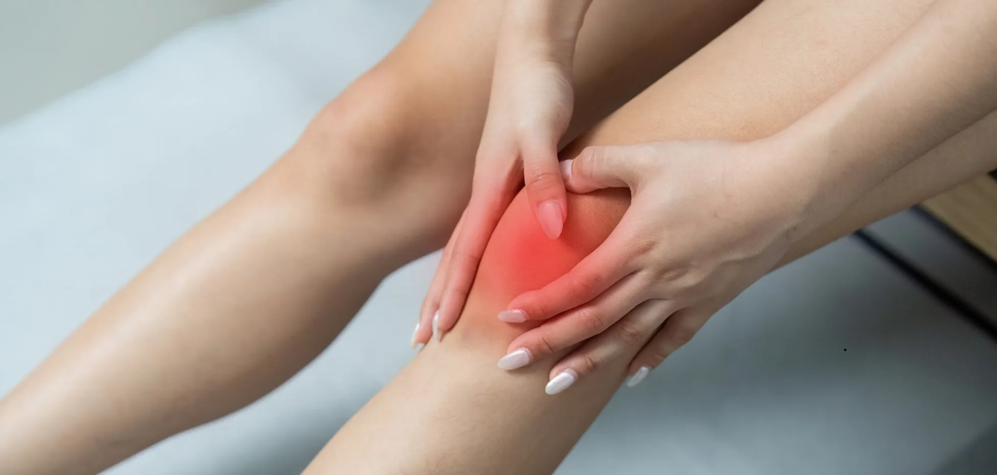 Therapist applying acupressure to a patient's back